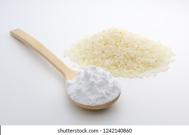 Wooden Spoon With Japanese Rice Starch Flour, Closeup, Short Grain Sushi Koshihikari Rice, High Resolution.