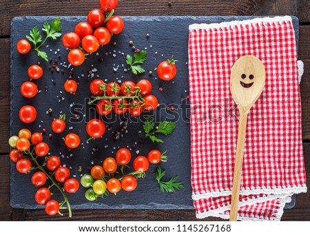 Image, Stock Photo red tomatoes on a black board