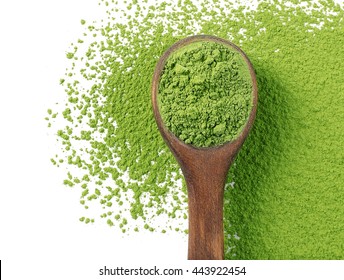Wooden spoon with powdered matcha green tea, isolated on white