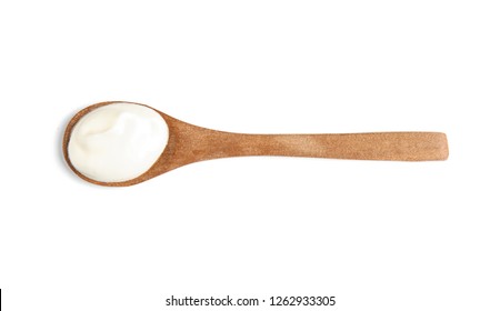 Wooden Spoon With Sour Cream On White Background, Top View