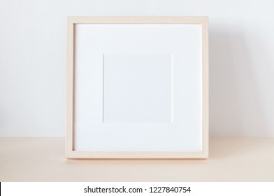 Wooden Square Frame With Poster Mockup.