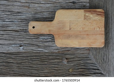 Wooden Square Pizza Tray Or Plate Placing On The Wooden Brown Table