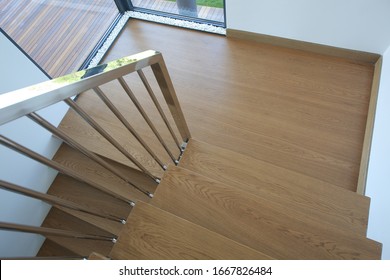 Wooden Staircase With Iron Banister In Modern House.
Solid Wood.