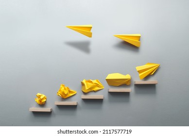 Wooden Steps With Different Stages Of Making A Paper Airplane, Before Taking Flight, Creating Something From Nothing Success Concept