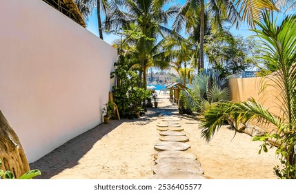 Wooden steps stairway path to tropical beach in Zicatela Puerto Escondido Oaxaca Mexico. - Powered by Shutterstock