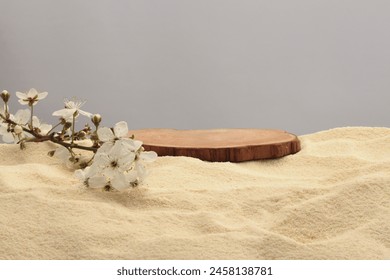 Wooden stump circle platform podium, flower twig on beige sand background. Minimal empty display product presentation scene. - Powered by Shutterstock