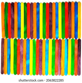 Wooden Sucker Stick Background Dyed With Food Colouring Highlighting Textures And Patterns 

