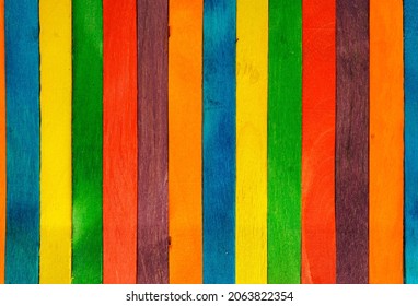 Wooden Sucker Stick Background Dyed With Food Colouring Highlighting Textures And Patterns 

