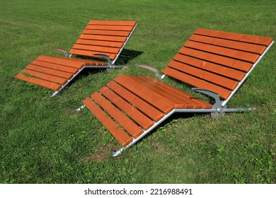 Wooden Sun Lounger Or Sun Bed. At A Green Summer Lawn. Stockholm, Sweden.