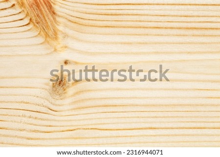 Wooden surface, processed polished stripped close-up macro structure bands, background