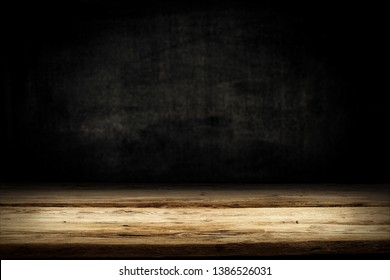 Wooden table background of free space for your decoration. Black shadow and wall of free space for your text.  - Shutterstock ID 1386526031