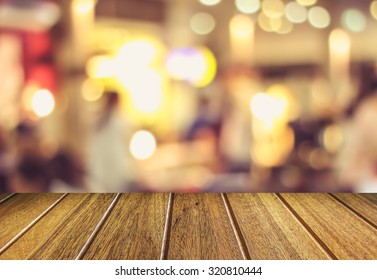 Wooden Table And Blurry Beer Garden Background