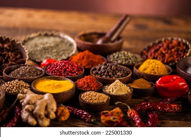 Wooden table of colorful spices