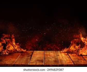 wooden table with Fire burning at the edge of the table, fire particles, sparks, and smoke in the air, with fire flames on a dark background to display products	 - Powered by Shutterstock