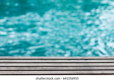  Wooden Table In Front With Swimming Pool