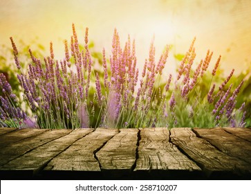 Wooden table with lavender. Wood tabletop with flowers