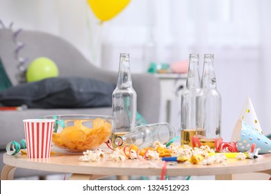 Wooden Table With Mess After Party Indoors