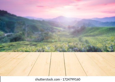 Wooden Table Or Wooden Mock Up Over Blurred Mountain Background During Sunrise