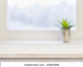 Wooden Table On Defocuced Winter Window Background