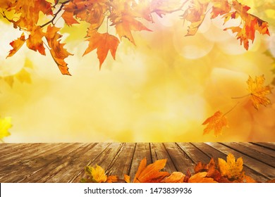 A Wooden Table With Orange Fall  Leaves, Autumn Natural Background