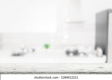 Wooden Table Over Blured Kitchen Interior Background