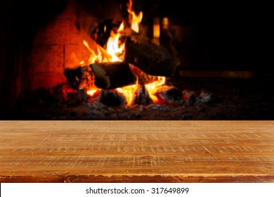 Wooden Table Over Fireplace. Christmas Holiday Concept