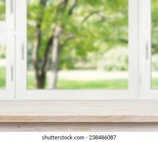 Wooden Table Over Summer Window Background