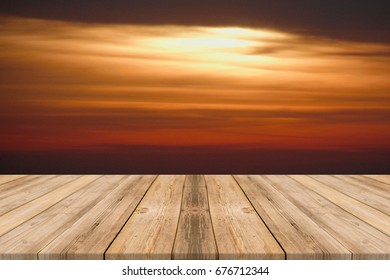 Wooden Table With Sunset  Background 