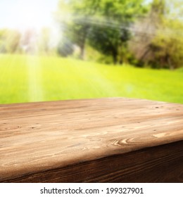 Wooden Table And Sunset In Park 