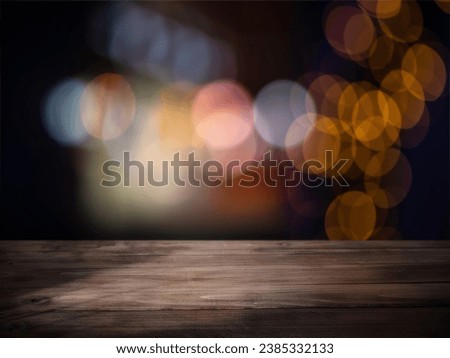 Wooden table surface with background bokeh lights