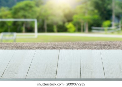 Wooden Table Surface On Park Background