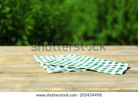 Similar – Tablecloth on wooden background