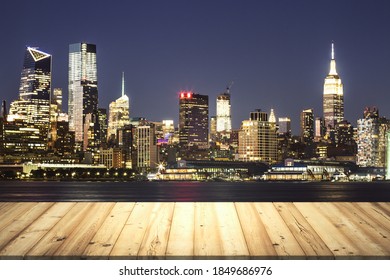 Wooden Table Top With Beautiful New York Skyline At Night On Background, Mockup