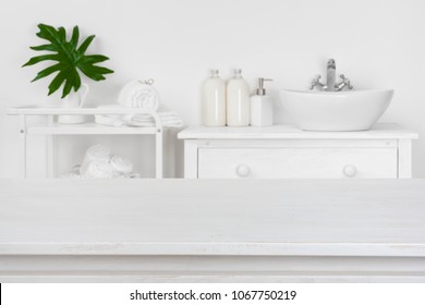 Wooden Table Top With Blurred Bathroom Interior For Product Display