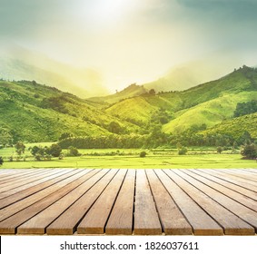 Wooden Table Top With The Mountain Landscape Natural Background