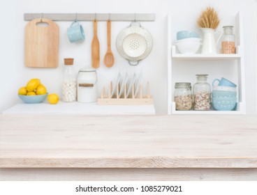 Wooden Table Top On Blurry Decorated Kitchen Interior Furniture Background