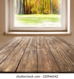 Wooden Table Top And Window Space And Autumn Forest 