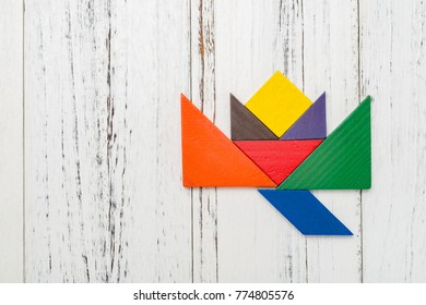 Wooden Tangram In A Lotus Shape With Copy Space