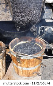 Wooden Tar Bucket At Construction Site