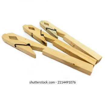 Wooden test tube holder isolated on white background. Used for holding laboratory tubes in science labs.  