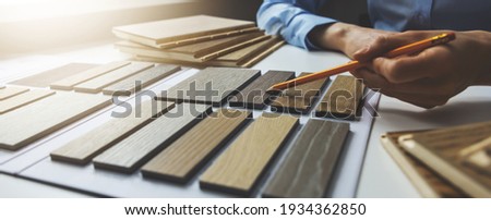 wooden texture furniture material samples for interior design. designer working in office. banner