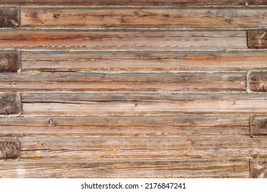 Wooden Texture Of The Log House Wall, Background.