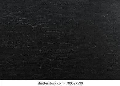 Wooden texture of painted wood. Black texture. Flat lay.
