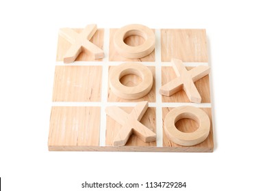 Wooden tic tac toe game isolated on white