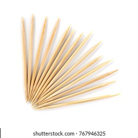 Wooden toothpicks on white background