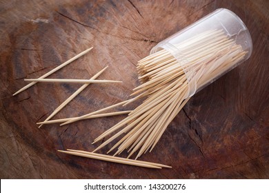 Wooden Toothpicks on wood background