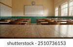 Wooden top with blurred empty classroom background can be used for mocking up or display product to make advertising.