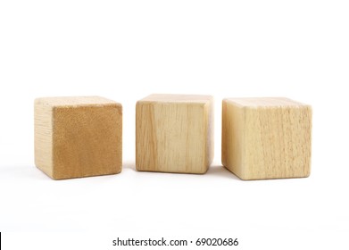 Wooden toy blocks on white background