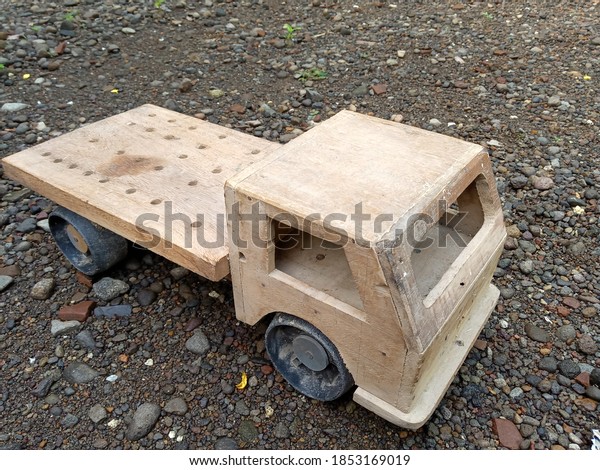 wooden toy\
car for children. toys from wood waste\
