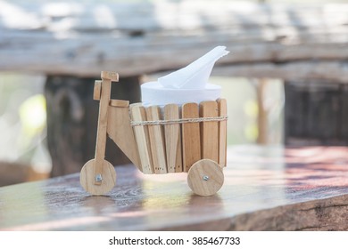 Wooden Toy Car For Tissue Box On Table.